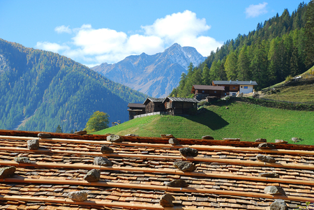 Typical roof of a Cottage in the Ultental Valley  (German: Ultental or Ulten, Italian: Val d'Ultimo), South Tyrol, Italy. The Ulten Valley  is a 40 km long mountain valley in South Tyrol in northern Italyの写真素材