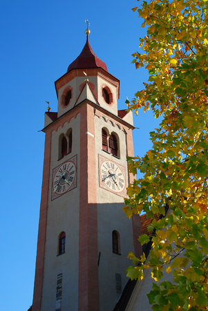 St. John the Baptist Parish Church in Tirol, Italy. Tirol  is a comune (municipality) in the province of South Tyrol in northern Italyの写真素材