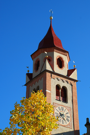 St. John the Baptist Parish Church in Tirol, Italy. Tirol  is a comune (municipality) in the province of South Tyrol in northern Italyの写真素材