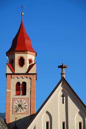 St. John the Baptist Parish Church in Tirol, Italy. Tirol  is a comune (municipality) in the province of South Tyrol in northern Italyの写真素材