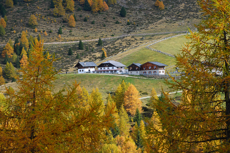 Hiking in the 'Hirzer' area with impressive autumn scenery, Sarntal Alps, South Tyrol, Italyの写真素材