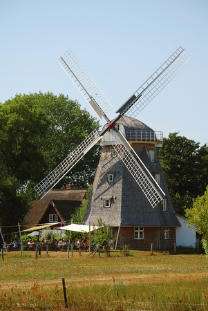 Windmill at Ahrenshoop, Darrs, Germany. Ahrenshoop is a municipality in Mecklenburg-Vorpommern, Germany on the Fischland-DarÃ-Zingst peninsula of the Baltic Seaの写真素材