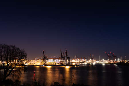 Hamburg harbor: container terminal in the port of Hamburg at nightのeditorial素材