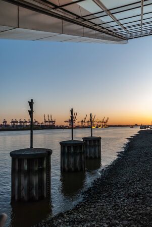 Hamburg harbor scenery at dusk. View from the office building
