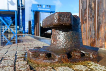Wittduen, Schleswig-Holstein, North Friesland, Germany: rusty bollard at the ferry port of Wittduen on Amrum in the north seaの写真素材