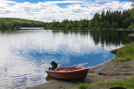 boat on lake in Scandinaviaの写真素材