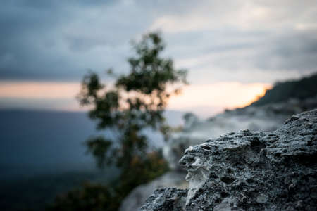 Sunset behind the rock.の写真素材
