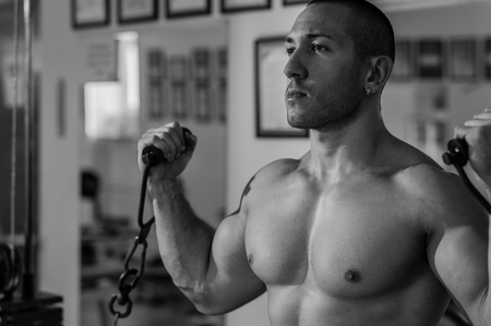 exercising at gym, black and white