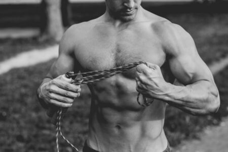 Closeup on muscular male torso with abdominal musclesの写真素材