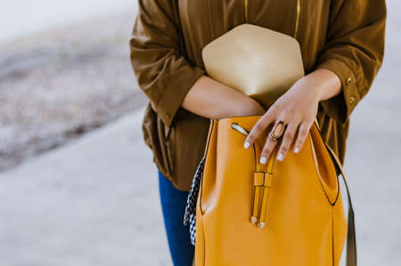 Close up woman checking her bagの写真素材