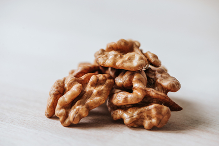 Walnut kernels on a table. Walnuts.の写真素材