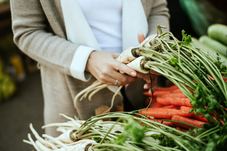 Woman shopping at local market.の写真素材