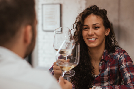 Couple enjoying wineの写真素材
