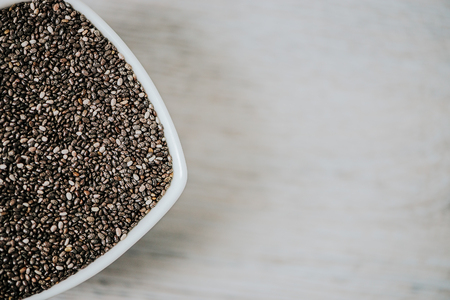 Top view of square ceramic bowl with chia seeds. Copy space.の写真素材