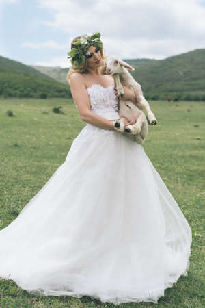 Bride in the mountains. The concept of lifestyle and weddingの写真素材