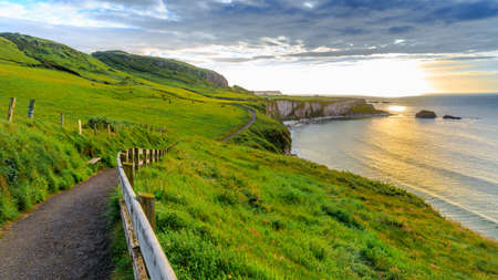 Coast with green grass nearby a carrick-rede-rob, Northern Ireland, UK.の写真素材