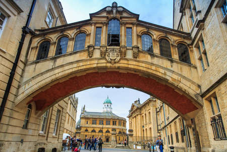 OXFORD - JUL 11, 2014 : Visitors are tooking photos at the Hertford Bridge, Oxford University, England.のeditorial素材