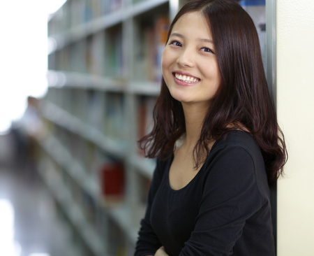 pretty positive asian Chinese female college education portraitの写真素材