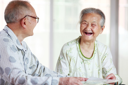 senior Chinese couple happy indoorの写真素材
