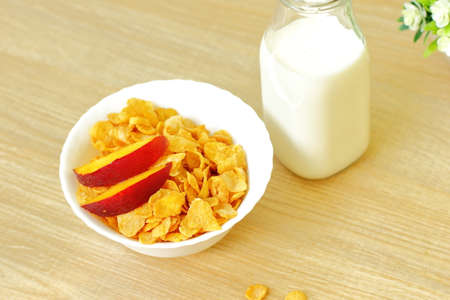 Cereals with milk for breakfast on the table
