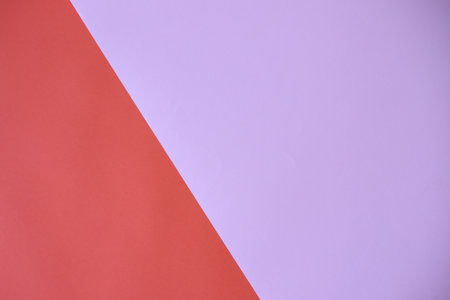Red lilac two colored paper backgroundの写真素材