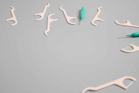 Plastic dental floss, oral tape for teeth cleaning, place for textの写真素材