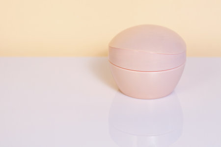 Mockup cosmetic container, pink bottle for cosmeticsの写真素材