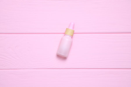 Pink cosmetic mockup bottle, beauty treatment packageの写真素材