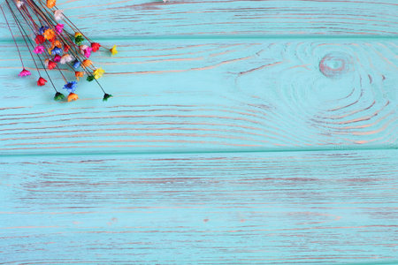 Blue green rustic wooden background with bunch of flowers, copy spaceの写真素材