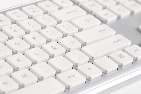 White pc keyboard in spanish, digital equipment