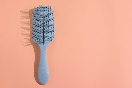 Hairbrush, modern brush for hair, accessories, copy spaceの写真素材