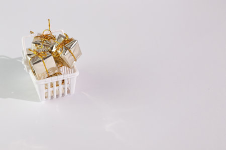 Christmas, New Year presents in shopping basket, copy spaceの写真素材