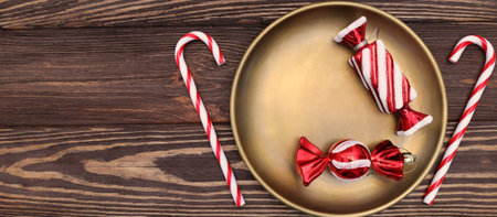 Copper plate mock up with Christmas and New year decoration on wooden tableの写真素材