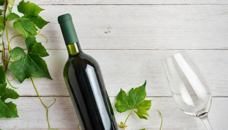 Vine bottle and glass template, mockup of winery brandingの素材