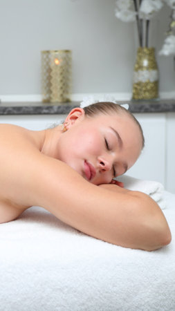 Body care. Spa body massage treatment. Woman having massage in the spa salonの写真素材