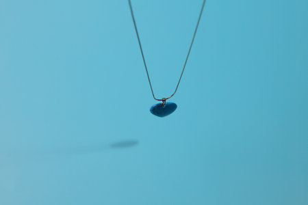 Turquoise pendant heart shape, elegant gem on silver chain