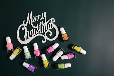 Manicure nails set with Christmas decoration, festive cardの写真素材