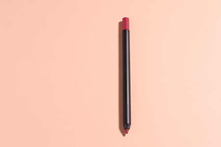 Lip makeup cosmetic, lipstick, pencil, minimalistic style, beauty conceptの写真素材
