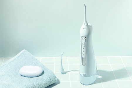 Dental irrigator, teeth health, electric oral device, bathroom lifestyleの写真素材