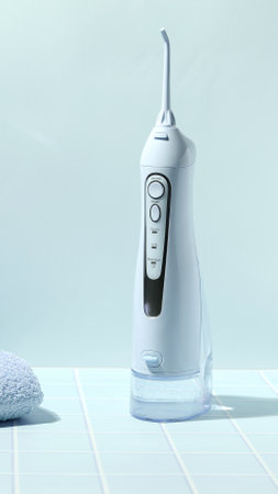 Dental irrigator, teeth health, electric oral device, bathroom lifestyleの写真素材