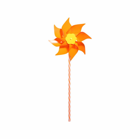 Pinwind toy isolated, orange windmill wheelの写真素材