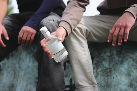 Alcoholism addiction, teenager alcohol problem, drunk conceptの写真素材
