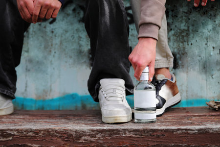 Alcoholism addiction, teenager alcohol problem, drunk conceptの写真素材