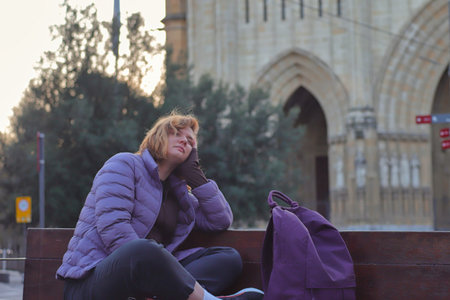 Solo travel, young female tourist, woman with a backpack traveling in Europe, Spain