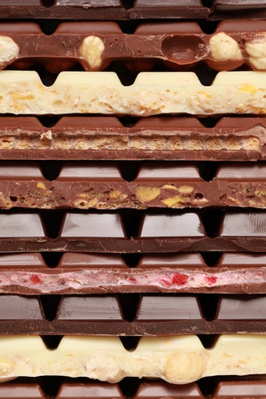 Different sorts of chocolate in a stackの写真素材
