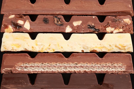 Different sorts of chocolate in a stackの写真素材