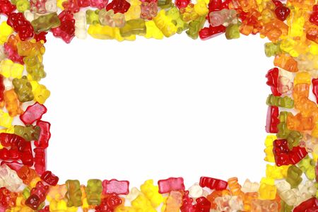 Close-up of delicious colorful gummy bears forming a frame.