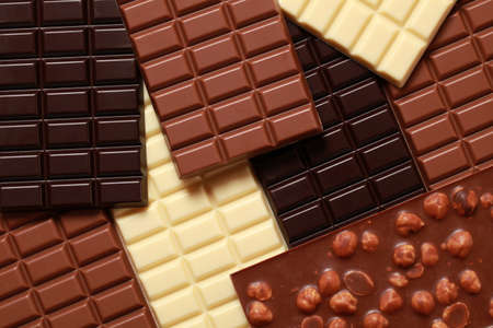 White, dark, milk and nut chocolate in a stack