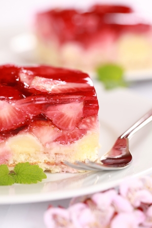 Close-up of a delicious strawberry pie with mint leavesの写真素材
