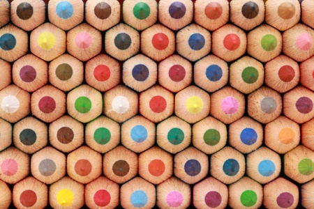 Colored crayons in a stack showing their tops. の写真素材